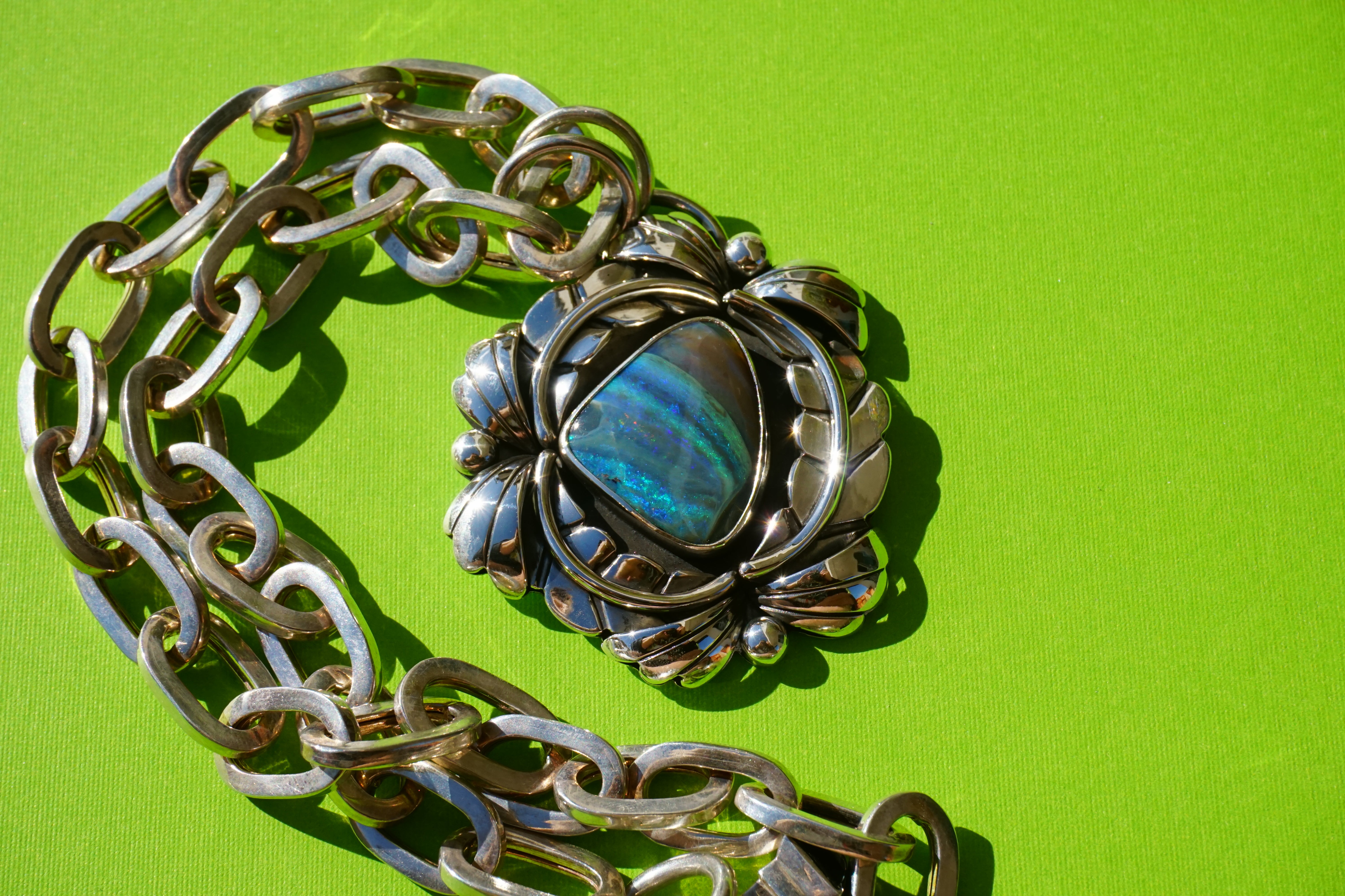 australian boulder opal leafy pendant with vintage paperclip chain.