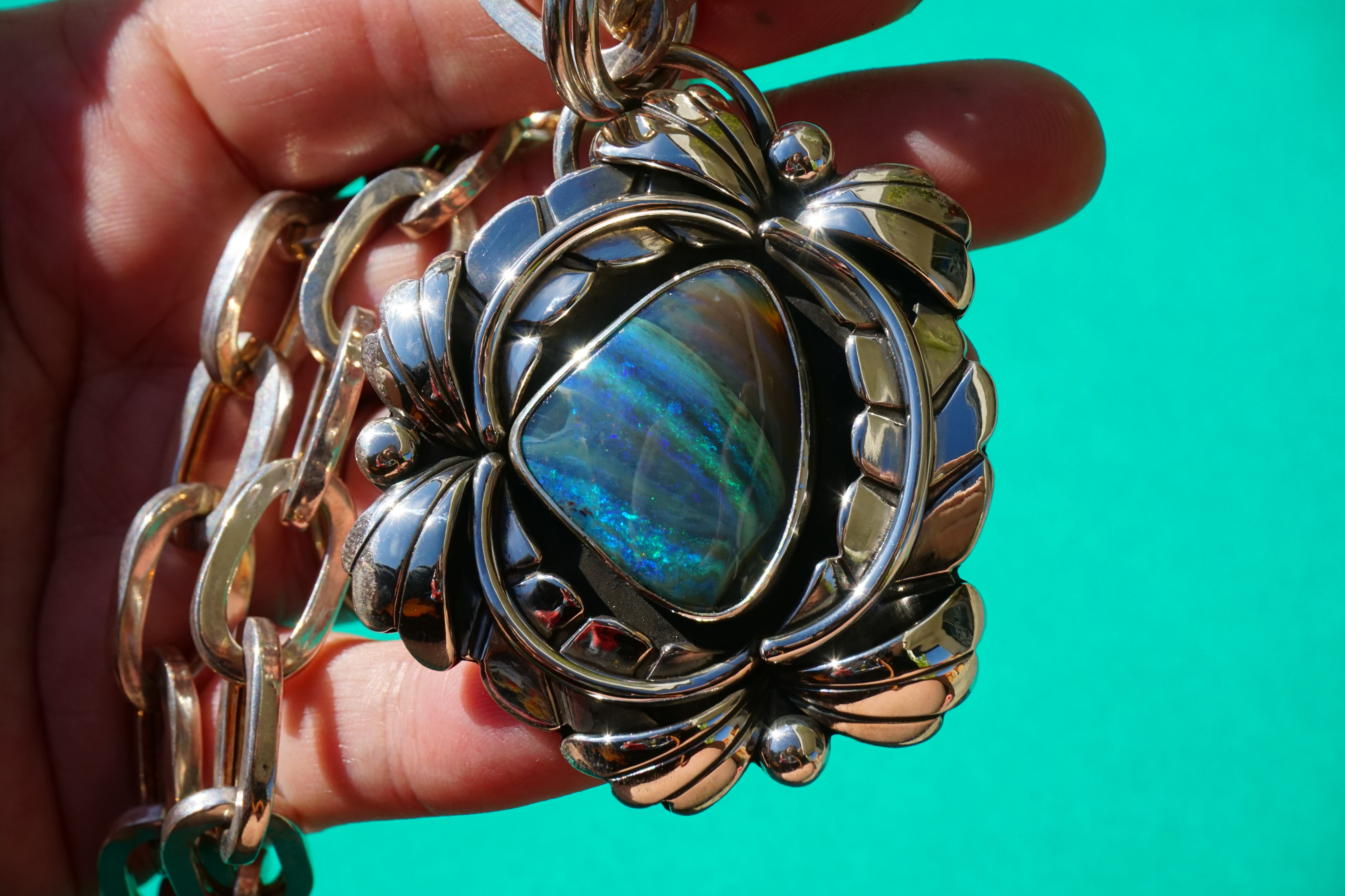 australian boulder opal leafy pendant with vintage paperclip chain.