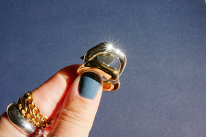 14k gold sqÜig ring. size: 7.25-7.5